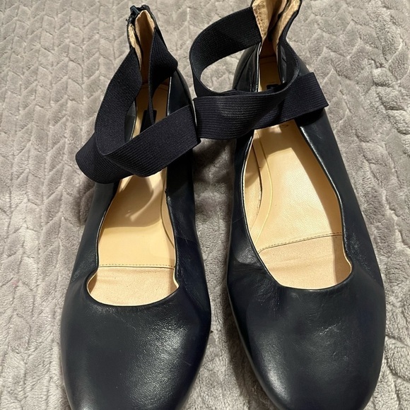 Alex Marie Shoes - Alex Marie, size 8, color blue flat shoe that has elastic that crosses in front!